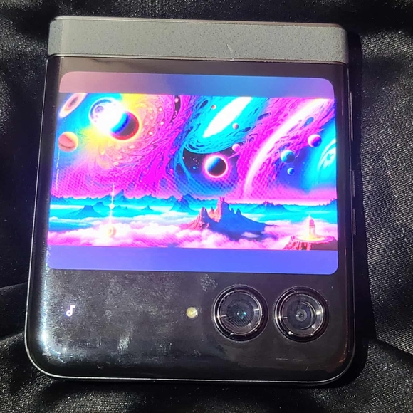 Motorola Black Foldable Phone with Dual Cameras